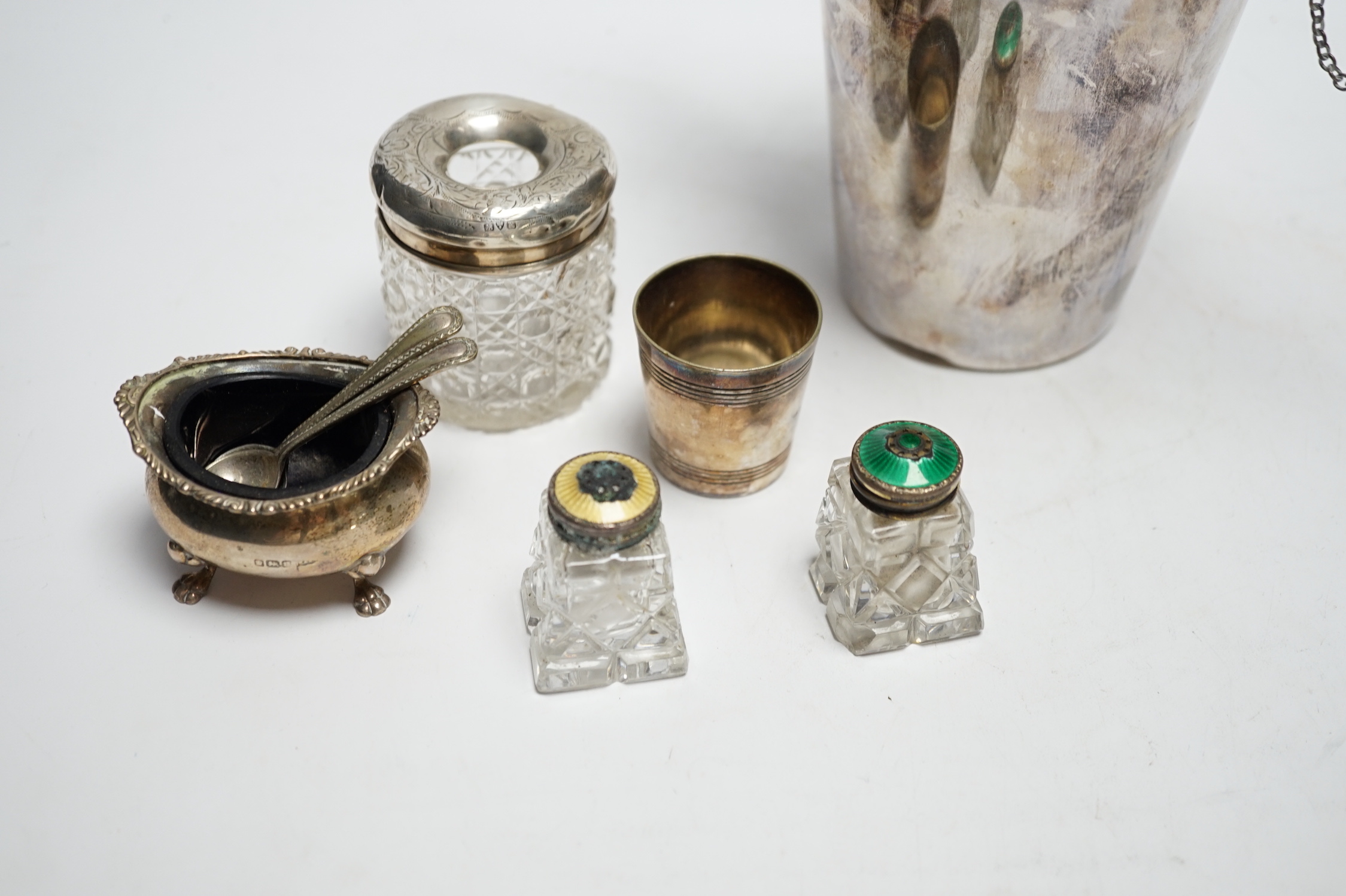 A plated cocktail shaker and sundry small silverwares including silver salt with Bristol blue glass liner, largest 23cm high